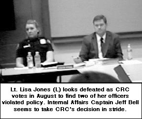 Lt Lisa Jones (L) looks defeated as CRC votes in August 
to find two 
of her officers violated policy. Internal Affairs Captain Jeff Bell seems to take CRC's decision in 
stride.